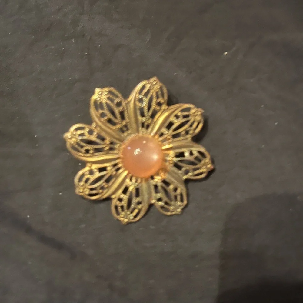 Vintage Gold Tone Filigree Brooch with pink stone center